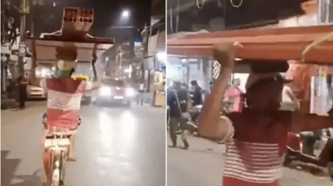 Viral Video: सिर पर बोझ उठा शख्स ने चलाई साइकल, देखने वालों ने दबा ली दांतों तली उंगी