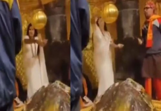 Viral video of a woman showering notes on Shivling