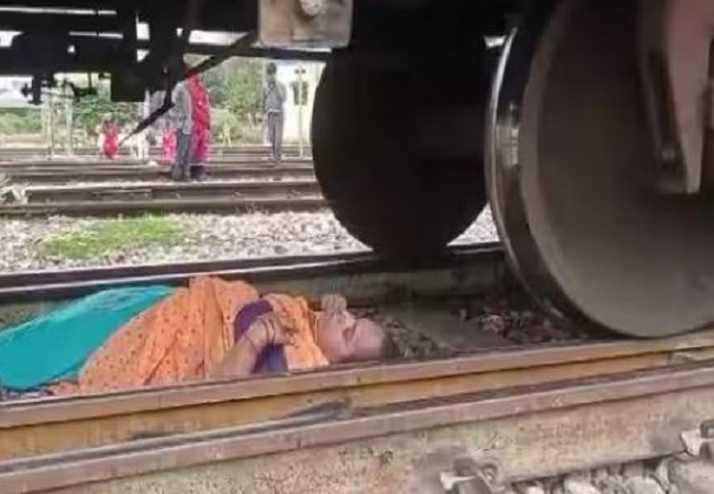 Viral Video Woman fainted on railway track, goods train passed over, still alive