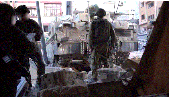 Israel Hamas War : इजरायली सेना ने अल शिफा अस्पताल परिसर की तलाशी ली, हथियार मिलने का दावा