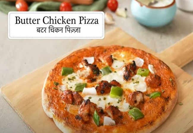 Butter Chicken Pizza: नए साल के जश्न में लगाएं बटर चिकन पिज़्ज़ा के स्वाद का तड़का, शेफ संजीव कपूर से जानिए बनाने का तरीका