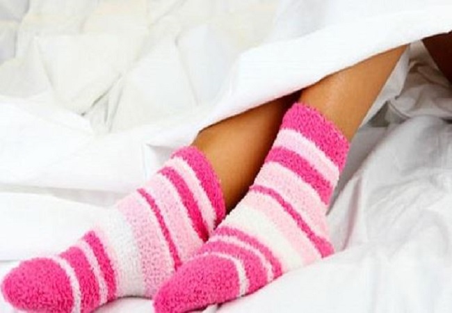 Side effects of sleeping wearing socks at night