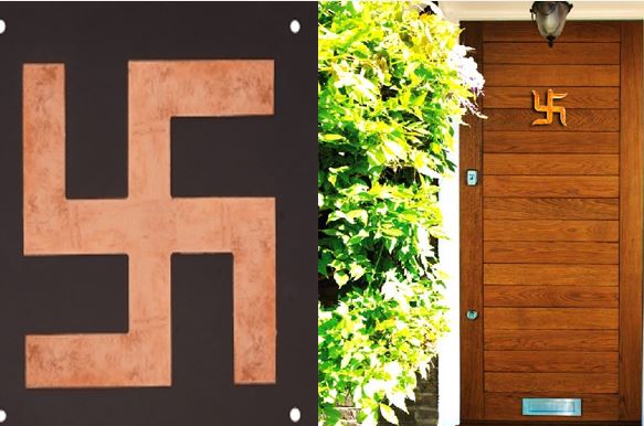 Swastika  Main Gate : मुख्य द्वार पर बना स्वास्तिक चिन्ह बनाने से मिलती है सफलता , जानें महत्व