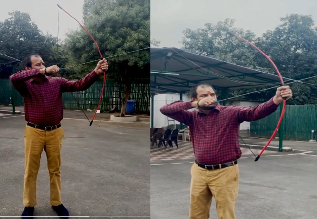 Bow in one hand and arrow in the other Tej Pratap Yadav