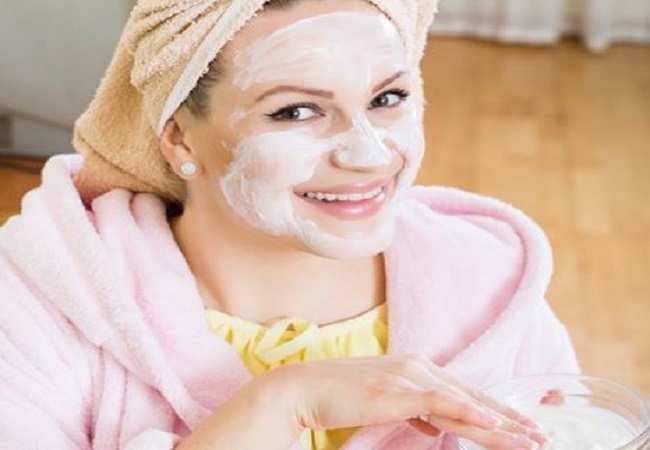 face pack of flour and curd on the face.