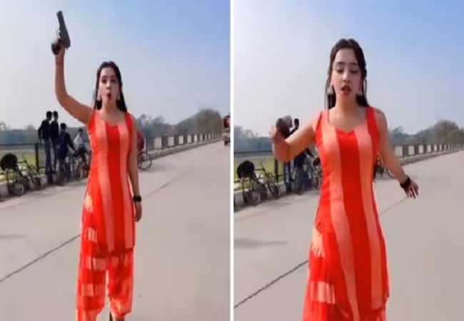 Viral Video: लखनऊ में युवती को बंदूक हवा में लहराते हुए रील बनाना पड़ा महंगा, एक्शन में आयी UP पुलिस