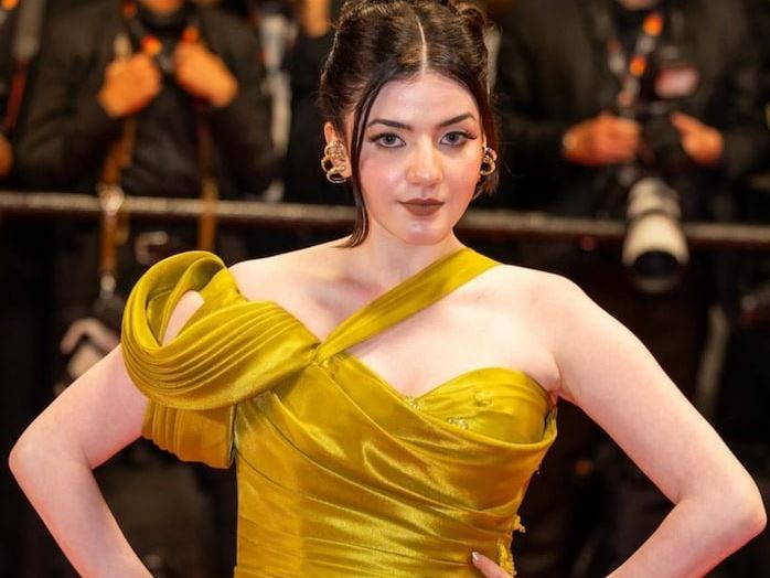 aastha-shah-cannes-film-festival-due-to-illness-aastha-shah-got-a-chance-to-attend-cannes-film-festival-the-actress-stole-the-show-in-green-gown