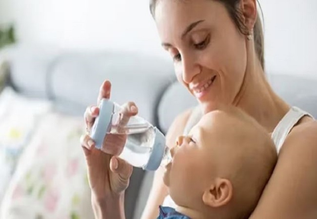 When should a new born baby be given water