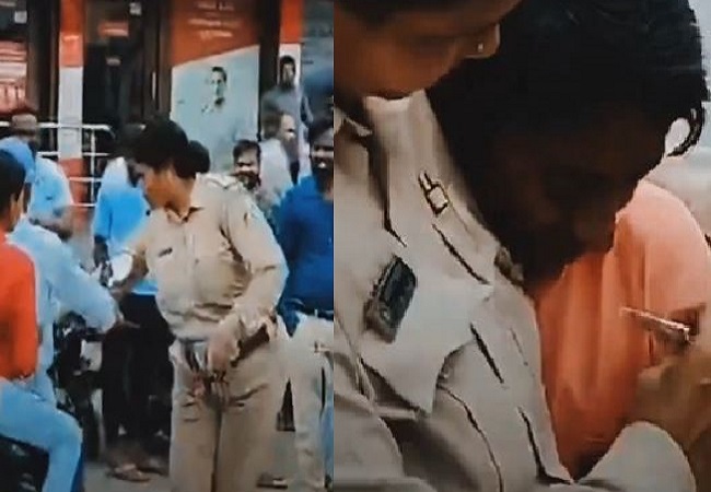 Female sub-inspector issued challan to youth for breaking traffic rules