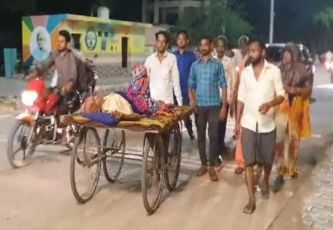 family members carried the patient on a cart.