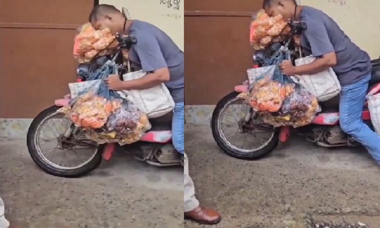 A person selling goods from street to street dies while sitting on a bike