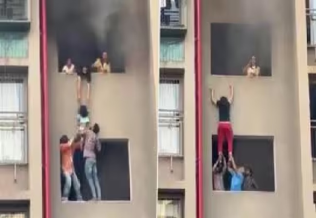 Horrifying Video : अहमदाबाद के पारिस्कर-1 अपार्टमेंट में लगी भीषण आग, बिल्डिंग से बच्चों को इस तरह बचाते दिखे लोग