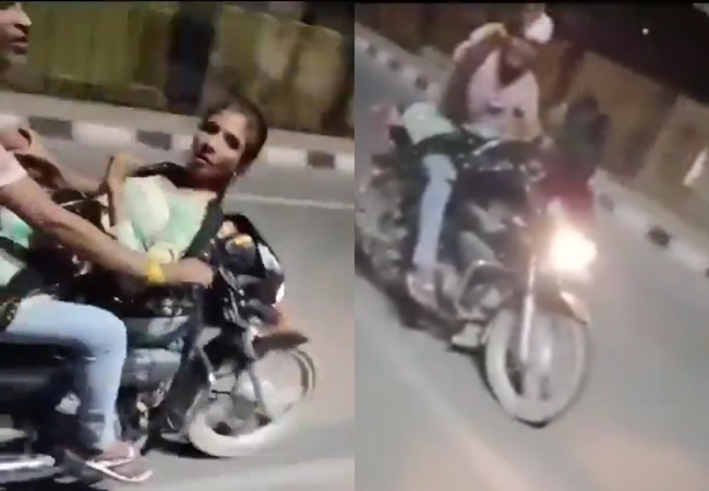 VIDEO: चलती बाइक पर कपल कर रहा था गंदा काम; राहगीरों ने टोका तो लड़की बोली- चलो निकलो-अपना काम करो
