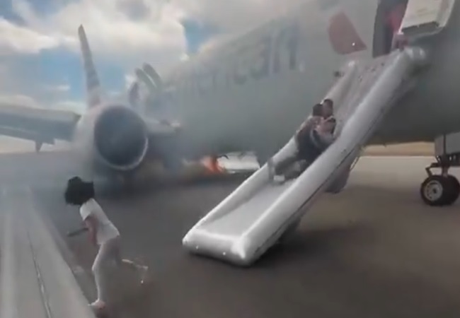 Video: अमेरिका में टेकऑफ के लिए तैयार था विमान; तभी लैंडिग गियर में लग गयी आग, इमरजेंसी स्लाइड्स से बाहर निकाले गए यात्री