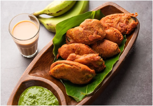 Coock Tips: आलू-प्याज नहीं, बारिश के मौसम में ट्राई करें केले के क्रिस्पी पकौड़े; भुलाए नहीं भूल पाएंगे स्वाद