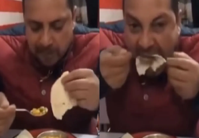 Viral Video: इस युवक के खाने का तरीका देख लोगों के उड़े होश , युजर्स बोले – अब तो गर्मा-गर्म खाऊंगा