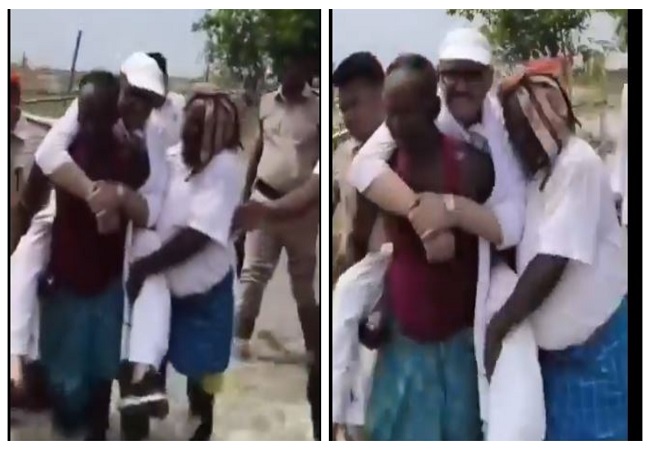 कांग्रेस सांसद ने युवक के कंधे पर बैठ कर किया बाढ़ का निरीक्षण- देखे वीडियो