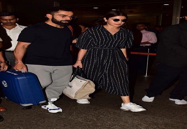 मुंबई एयरपोर्ट पर पत्नी के साथ दिखे क्रिकेटर विराट कोहली, आठ साल बॉलीवुड में वापसी करने जा रही है अनुष्का शर्मा