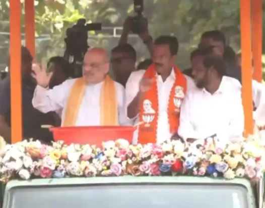 Kerala Assembly Elections 2026 : कोझिकोड में अमित शाह ने किया रोड शो , विकास, सुरक्षा और बेहतर शासन का किया वादा