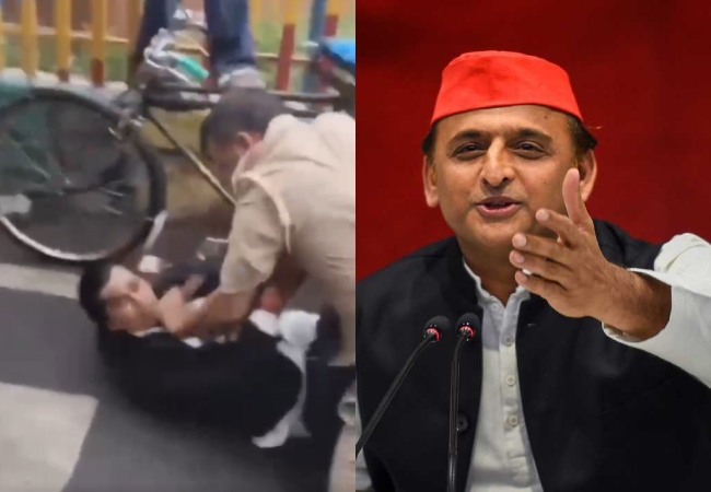Video- कानपुर में बीच सड़क पुलिसकर्मी और वकील में चले लात-घूंसे, अखिलेश बोले- उप्र की फ़िल्म सिटी में शूटिंग शुरू हो गई क्या?